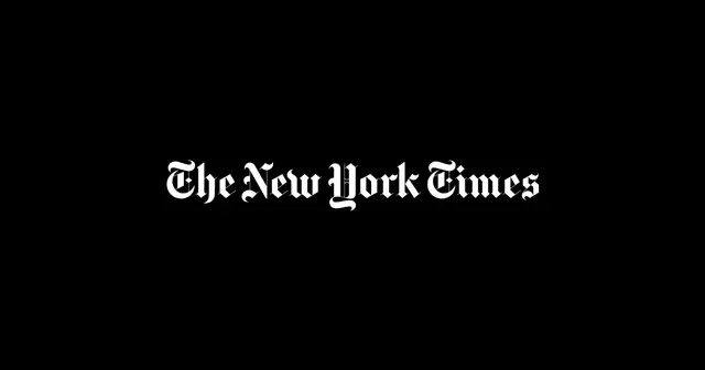 The New York Times masthead — white blackletter logo on black background