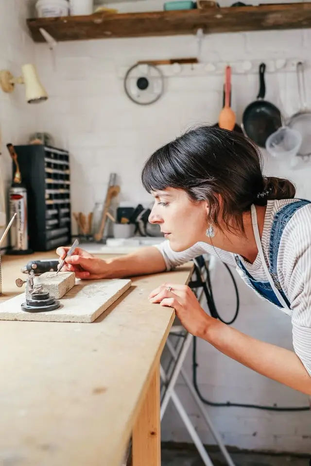 Amy Leigh Design — workshop close-up: rotary tool sanding a board