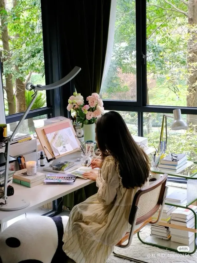 Sunlit home watercolor studio with garden view