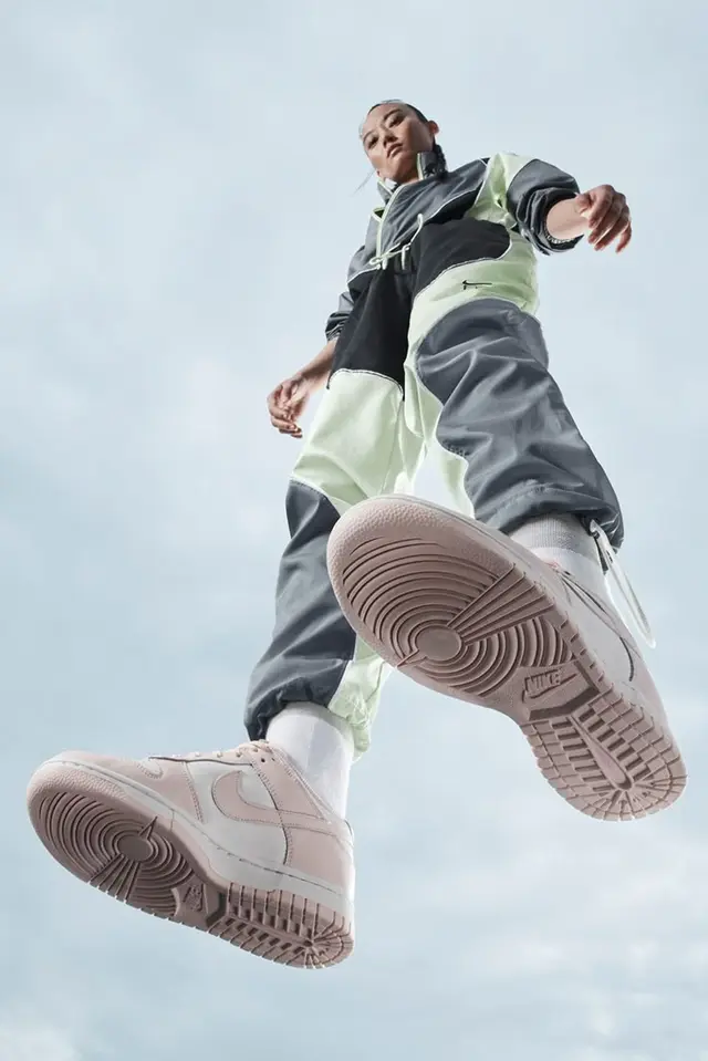 Nike — Spring Essentials (Swoosh logo header)