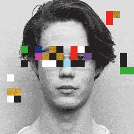 Grayscale studio portrait with colorful pixel block overlay