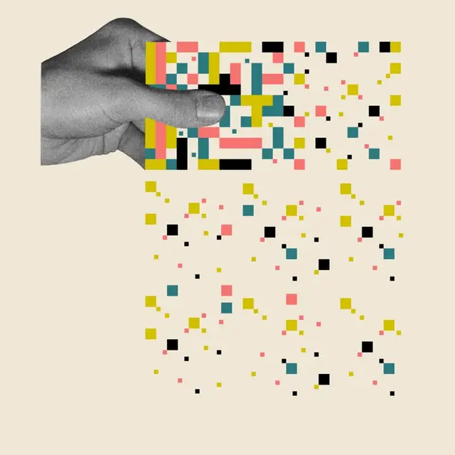 Photomontage: Hand Holding Disintegrating Pixel Grid