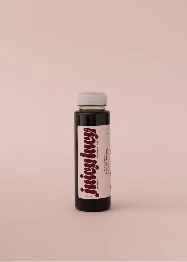Juicy Lucy Packaging — Charcoal Mushroom Juice in Pale Pink Label (SOMEKIND / DIELINE)