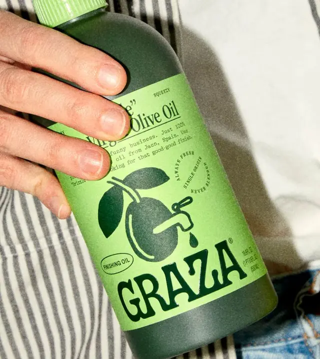 Graza extra virgin olive oil — neon green and yellow illustrated can packaging