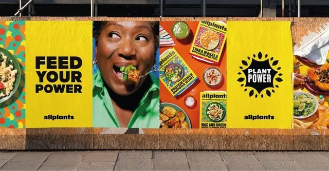 Allplants 'Feed Your Power' outdoor campaign — bright yellow poster mural
