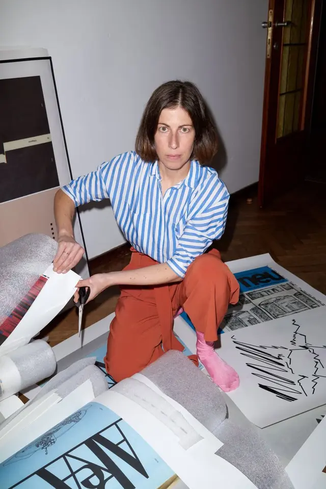 STEPHANIE SPECHT — studio portrait with posters by Mads Teglers