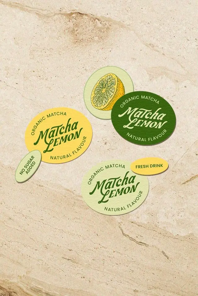 Dagos Design — green calligraphic wordmark