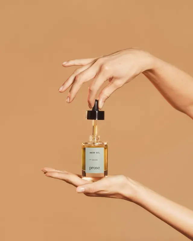 Prose — The Ultimate Guide to Hair Oils (hero image: model with long brown hair)