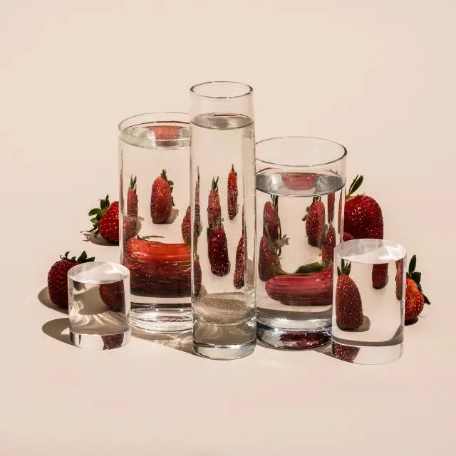 Bananas Refracted Through Water-Filled Glass Vessels — Suzanne Saroff (Perspective series)