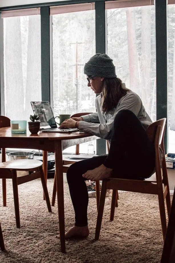 Cozy winter work-from-home setup at dining table — Nattie on the Road