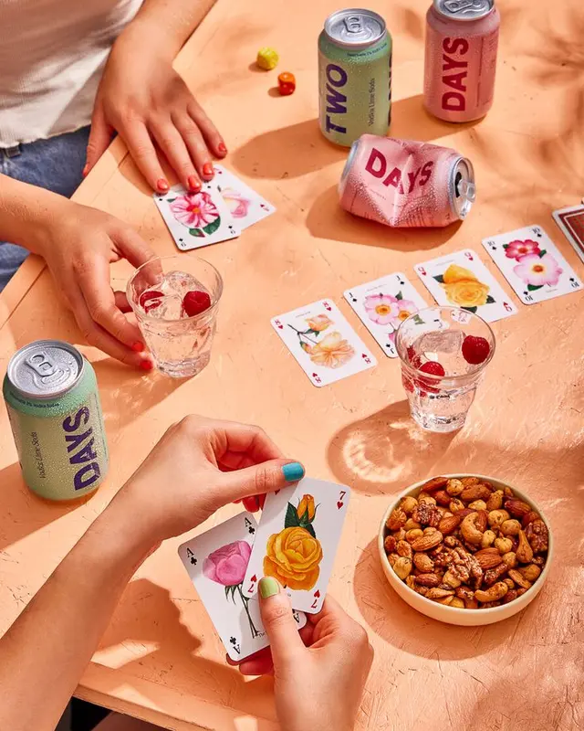 Tabletop Game Night — Floral Playing Cards, 'DAYS' Cans and Mixed Nuts by Chloe Hardwick