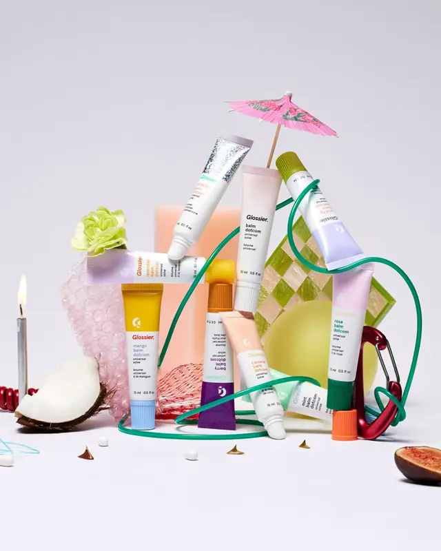Glossier Balm Dotcom Relaunch — Mango tube still life