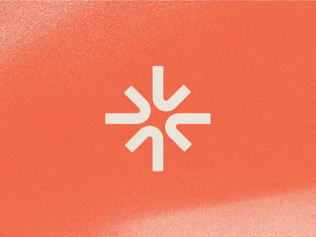 L Spark — white geometric spark logo on coral textured background