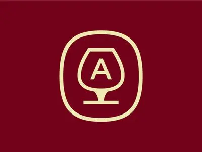 Monogram Snifter Logo — Gold A in Cognac Glass on Burgundy