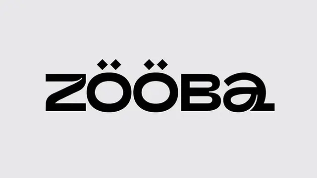 Zooba visual identity — bold geometric posters and green napkins by &Walsh (Designboom)