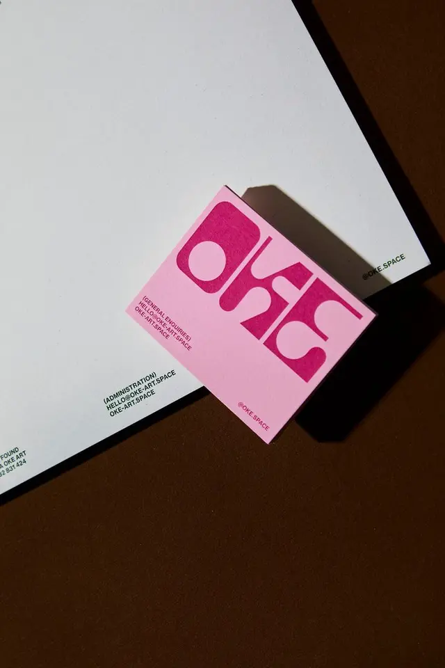 OKE — pink business card and letterhead (Thought & Found portfolio)