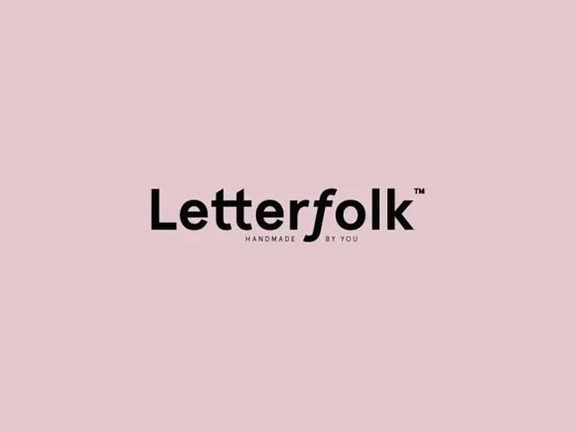 Letterfolk wordmark on dusty pink background