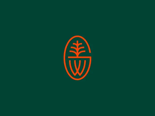 GW monogram emblem — orange plant badge on forest green