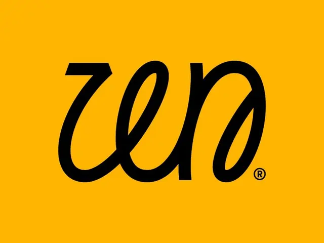 Zero — black script wordmark on yellow background
