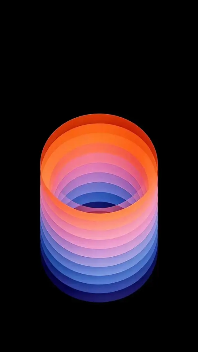 Layered Gradient Cylinder — Orange to Blue Paper Rings on Black