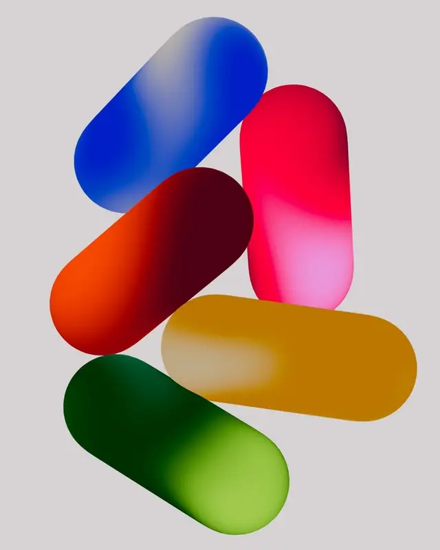 Stacked glossy pill capsules — colorful 3D gradient study