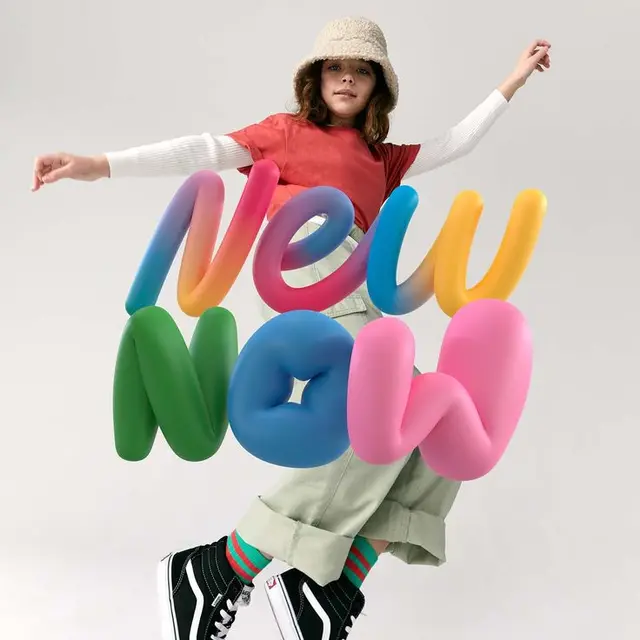 Fashion campaign — model with colorful 3D "New Now" balloon lettering