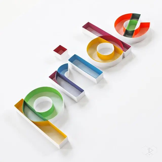 Multicolor 3D paper-band lowercase letters on white background