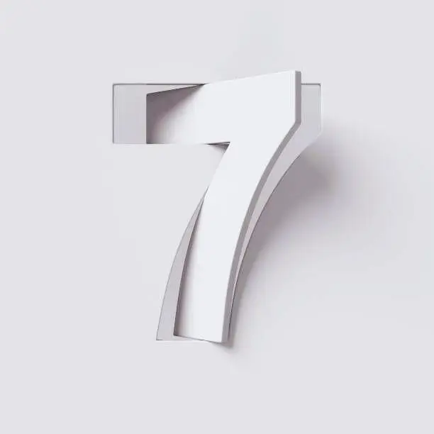 White layered paper-cut numeral 7 on pale grey background