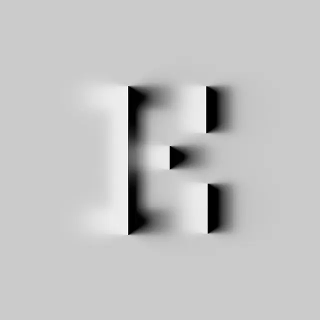 Embossed 3D capital 'E' with soft directional shadows