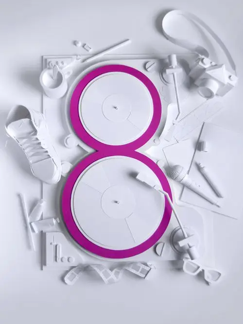 Paper-sculpted figure '8' made from vinyl turntables with magenta rims