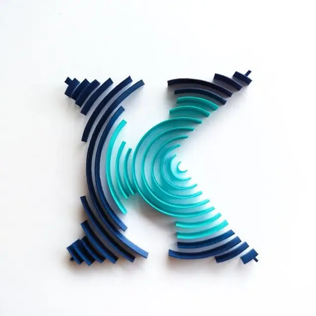 Layered concentric 'X' sculpture in teal and navy