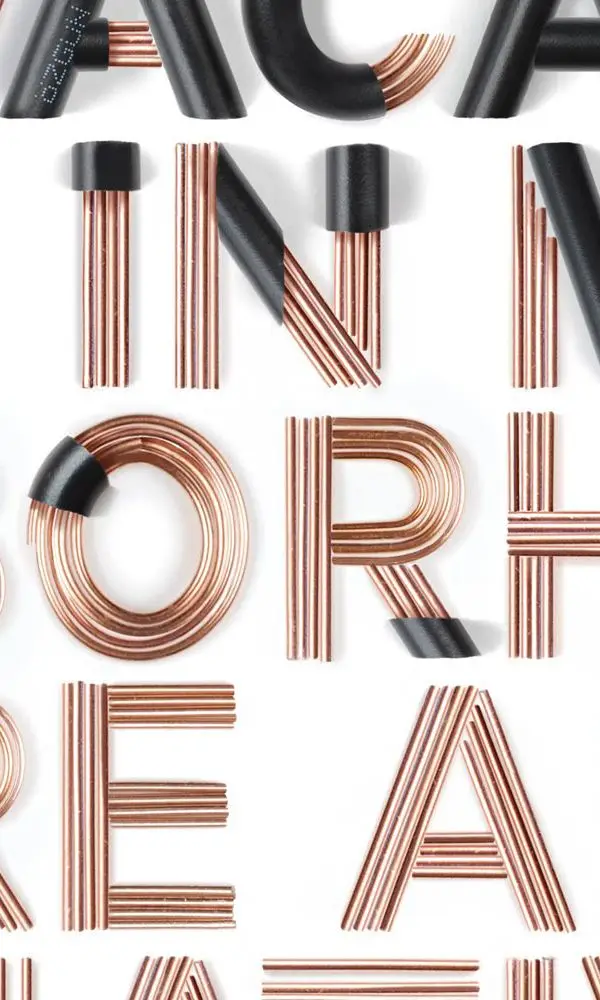 Copper-rod Typography with Black Insulation — Photoreal Flat-lay