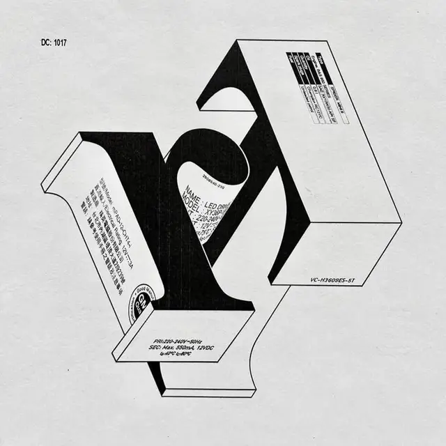 Isometric typographic 'Y' constructed from labeled packaging boxes — black & white print