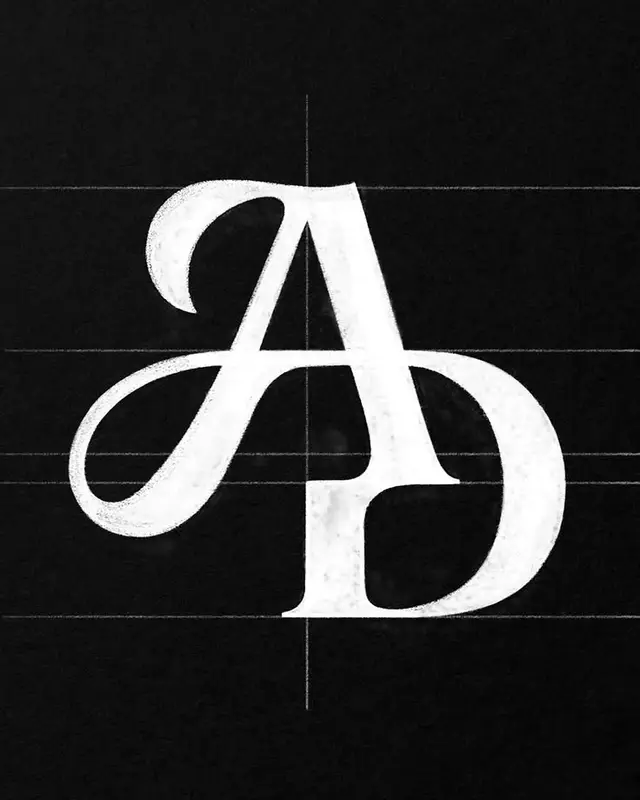 Monochrome Serif Monogram 'AD' with Chalk Texture and Lettering Guides