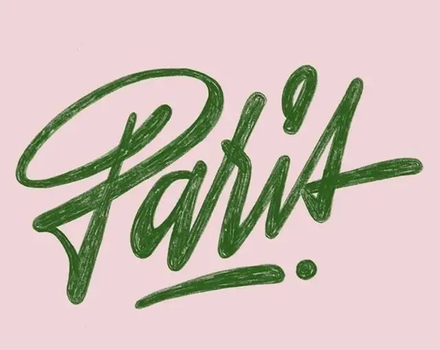 Hand-lettered "Paris!" green script on pastel pink background