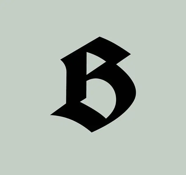 Blackletter 'B' monogram on pale sage background