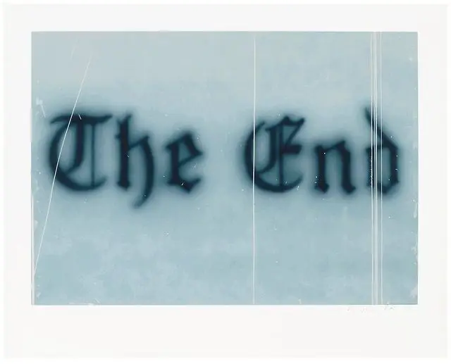 Polaroid-style image: "The End" in blurred blackletter