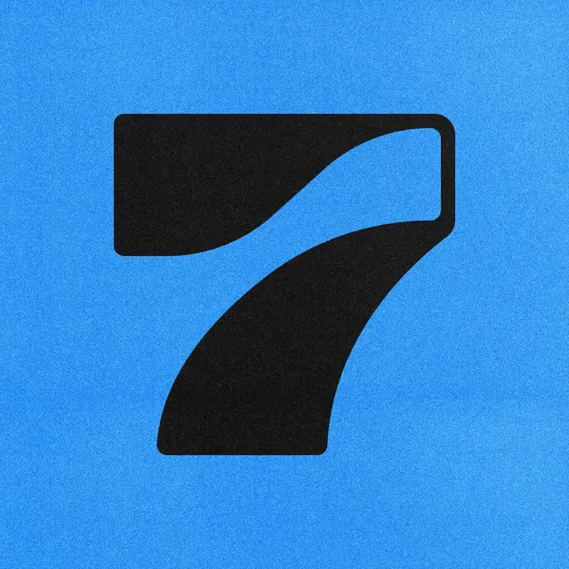 Bold Graphic Numeral 7 on Textured Blue Background