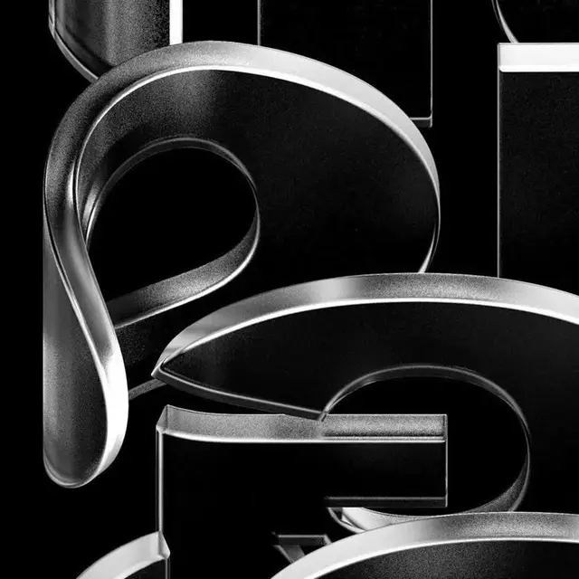 Macro study of black glossy 3D letterforms with frosted edges