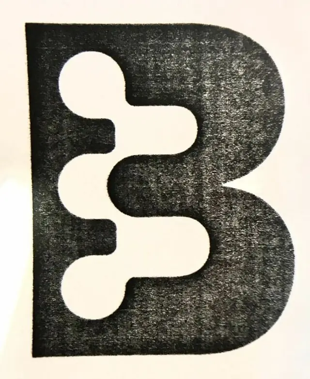 Textured black ink uppercase 'B' with organic negative-space counters
