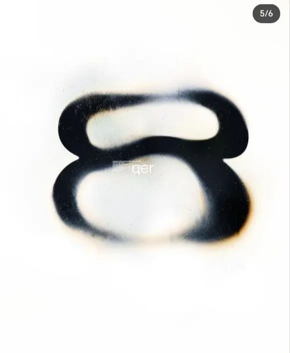Airbrushed Black Double-Loop Stencil on White Paper