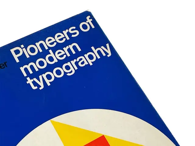 Book cover: "Pioneers of modern typography" — blue cover with geometric pie motif
