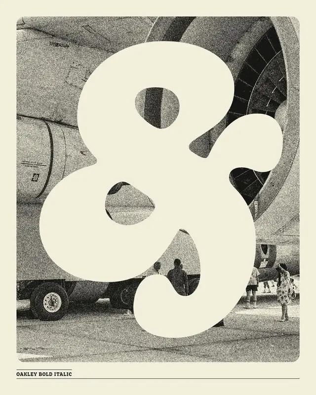 Oversized ampersand poster over halftone jet engine photo