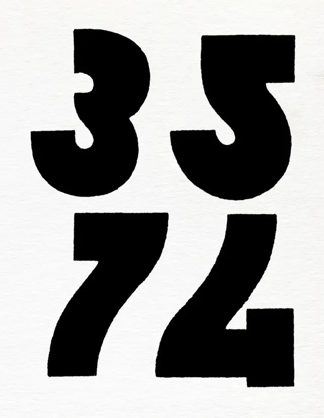 Bold hand-painted numerals 3 5 7 4 on textured paper