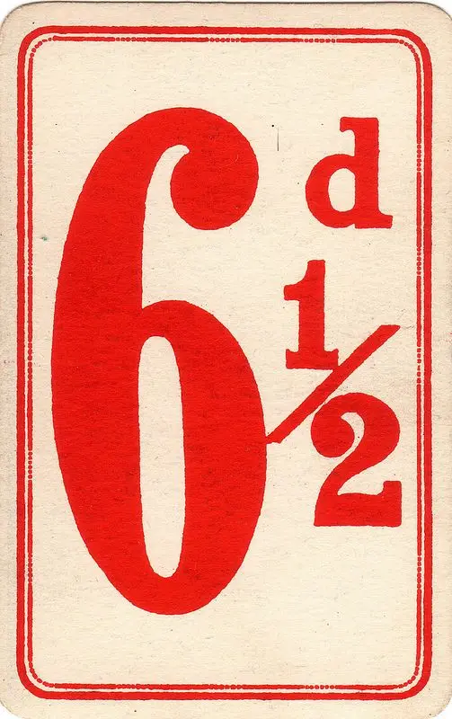 Vintage red printed price card with '6 d 1/2'
