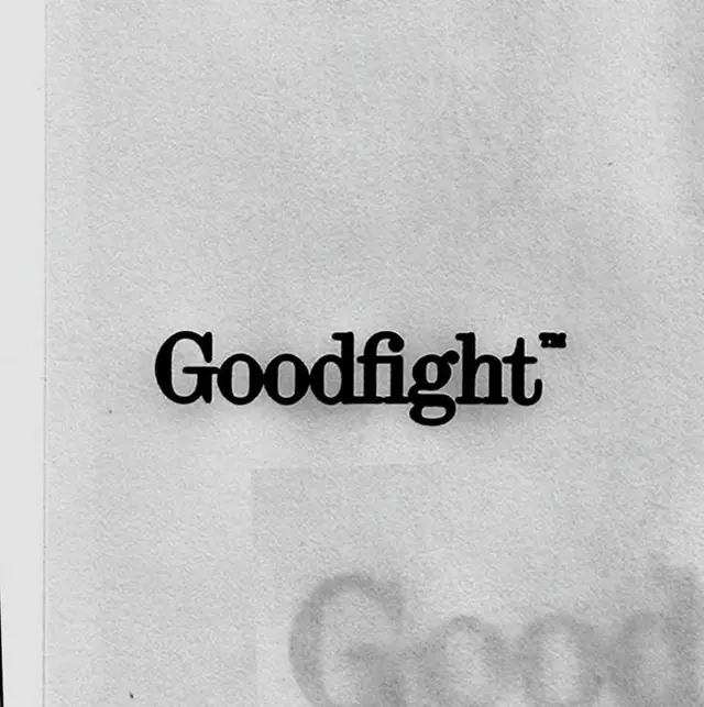 Goodfight wordmark printed on textured paper