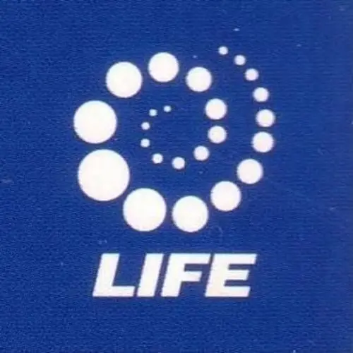 White dot-spiral logo with LIFE wordmark on blue field
