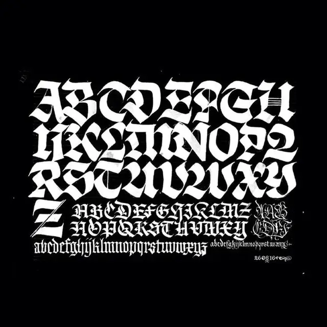Blackletter / Fraktur Alphabet Specimen — White on Black Calligraphy Sheet
