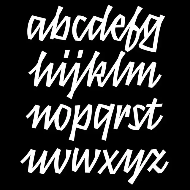 Angular brush-script lowercase alphabet — white on black