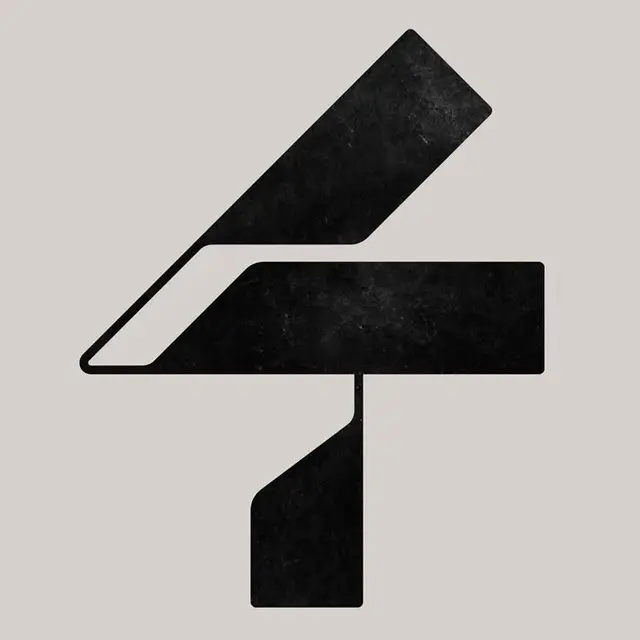 Minimalist Black Geometric Logo Mark on Beige Background